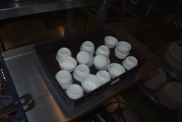 *Basket Containing Small White Ramekin Dishes