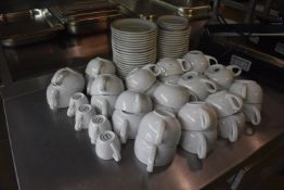 *Twenty-Eight Coffee Cups and Four Espresso Cups