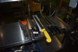 *Assorted Chef’s Knives, Basting Brush, and Steel