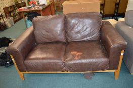 Two Seat Leather Sofa on Wooden Frame (requires at