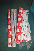 *Three Rolls of Christmas Wrap