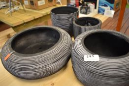 *Four Grey Plastic Planters