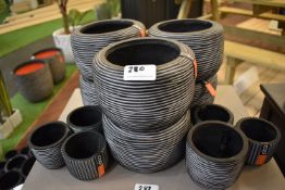 *Twelve Assorted Grey Plastic Planters