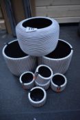 *Eight White Plastic Planters