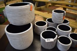 *Twelve White Plastic Planters
