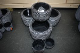 *Eight Grey Plastic Planters