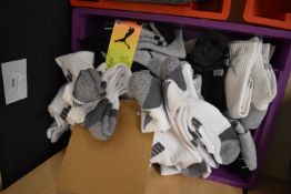 *Quantity of Puma Socks (tray not included)