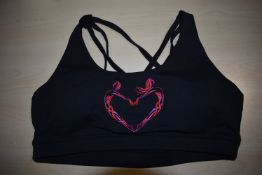 *Four Silhouette Sports Bras Size: L