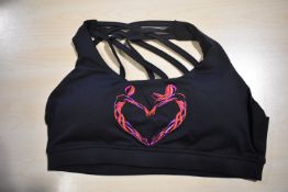 *Four Silhouette Sports Bras Size: S