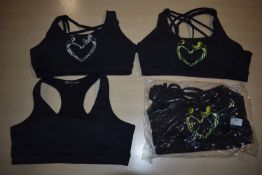 *Four Silhouette Sports Bras Size: M