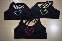 *Three Silhouette Sports Bras Size: L