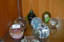 Seven Glass Paperweights