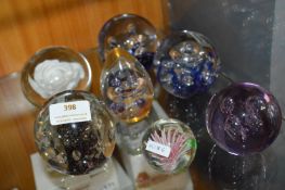 Seven Glass Paperweights