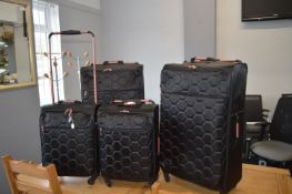 Set of Four Linear Travel Cases