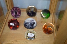 Seven Glass Paperweights