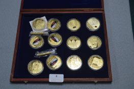 Display Case Containing 12 William and Kat Commemo