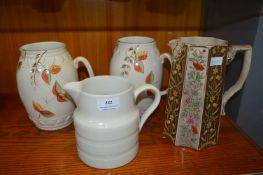 Four Pottery Jugs Including Arthur Woods etc.