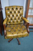 Mustard Leather Chesterfield Swivel Armchair