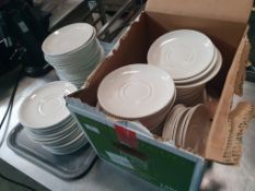 * large quantity of saucers