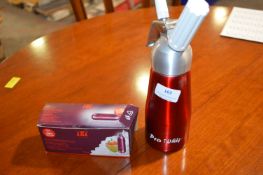 *Cream Frother and a Quantity of Canisters