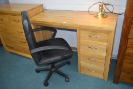 Solid Oak Four Drawer Desk with Swivel Chair