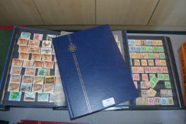 Three Stock Books of Zimbabwe and Other Stamps