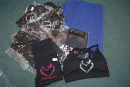 *Assorted Yoga Clothing Items and a Yoga Mat