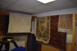 *Eight Assorted Rugs