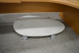 *White Egg-Shaped Table on Four Silver Legs