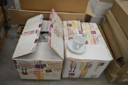 *Two Boxes of White Coffee Cups and Saucers