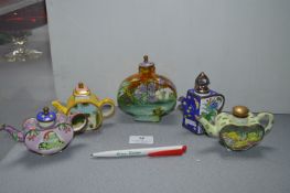 Four Miniature Decorative Frog Teapots and a Paint