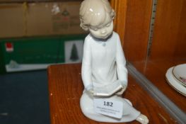 Lladro Nao Figurine of a Child Reading