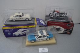 Three Diecast Vehicles: Triumph Bonneville, Jaguar