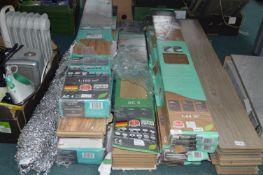 Seven Packs of Assorted Laminate Flooring Planks b