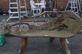 Carved Tree Trunk Bench