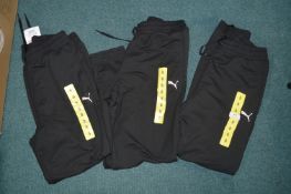 *Three Puma Joggers Size: 4