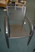 *Grey Metal Stacking Chair