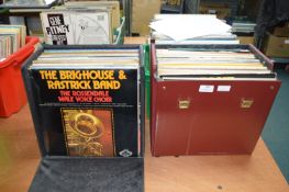 Two Record Cases Containing 12