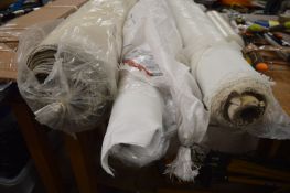 *Three Rolls of Material