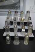 Fifteen Decorative Glass Sugar Castors with EPNS Tops