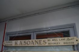 Wooden Shop Sign form Sloan's Plumbers & Glaziers