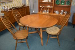 Ercol Oval Extending Dining Table with Four Ercol Chairs