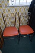 Pair of Chrome Framed Stools with Orange Vinyl Seats