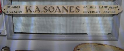 Wooden Shop Sign form Sloan's Plumbers & Glaziers