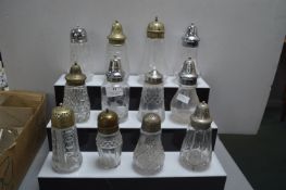 Twelve Decorative Sugar Casters with EPNS Tops
