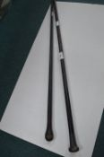 Two Ebonised Walking Canes (one with silver top)