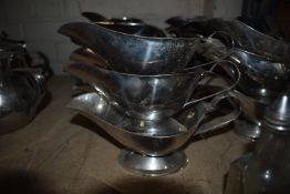 Twelve Stainless Steel Sauceboats