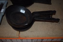 *Seven Black Iron Sauté Pans