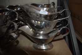 Twelve Stainless Steel Sauceboats