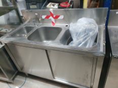 * S/s triple sink with taps. With under cupboard/sliding doors. 1300w x 600d x 1100h